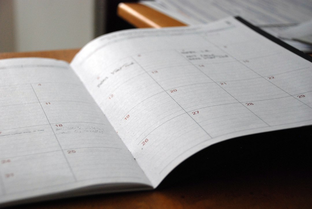 Open monthly planner used for a personal review